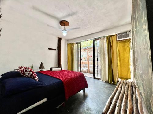 Postel nebo postele na pokoji v ubytování Awa Eco Retreat Tulum