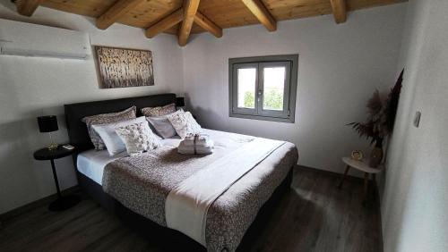 Ένα ή περισσότερα κρεβάτια σε δωμάτιο στο Alvesta Guest House