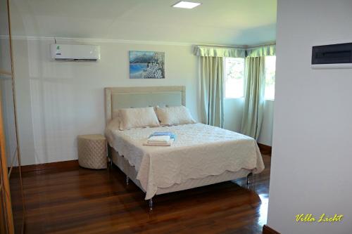 Voodi või voodid majutusasutuse Villa Licht, Obligado Center toas