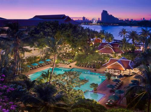 an aerial view of the pool at the resort at Anantara Riverside Bangkok Resort in Bangkok