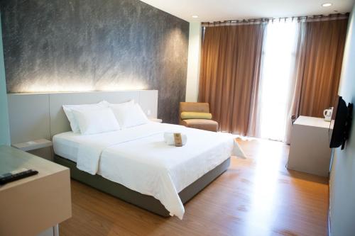 Postel nebo postele na pokoji v ubytování Inn86