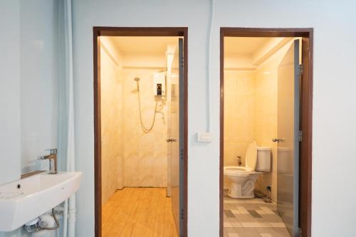 a bathroom with a shower and a sink and a toilet at Dec room at bangsue in Bang Su