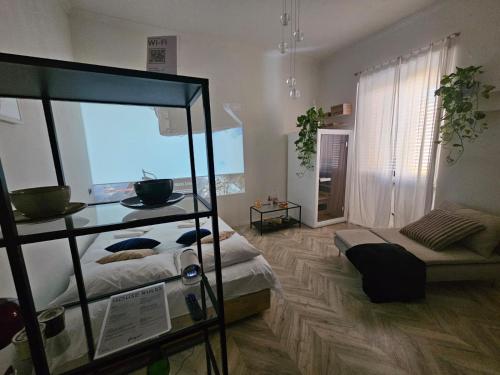 Voodi või voodid majutusasutuse Solaris Home Spa toas