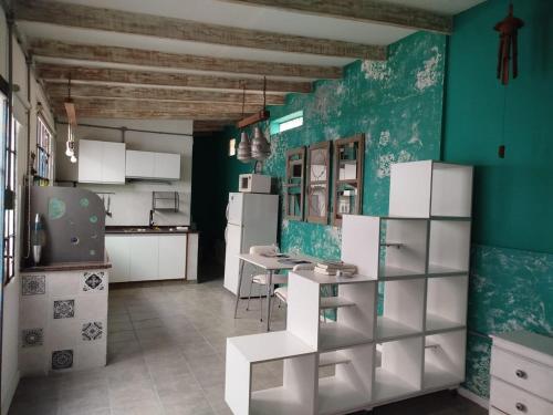 Η κουζίνα ή μικρή κουζίνα στο Refugio Urbano