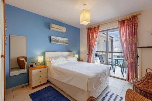 Ένα ή περισσότερα κρεβάτια σε δωμάτιο στο Kapparis Beach Escape