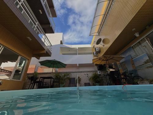 Bazén v ubytování Pousada Residência dos Sonhos nebo v jeho okolí