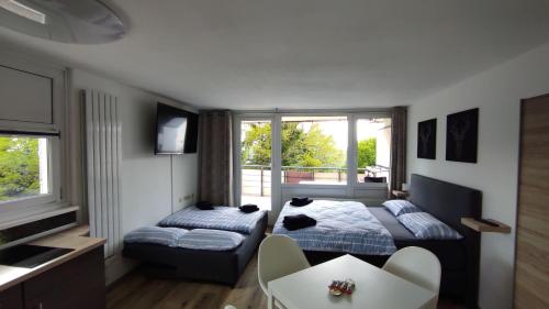 Postel nebo postele na pokoji v ubytování Appartement In Sankt Englmar Mit Großem Balkon