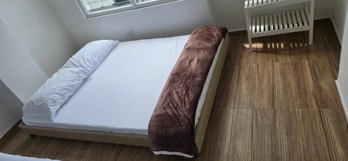 Giường trong phòng chung tại Increíble apartaestudio centro de Pitalito
