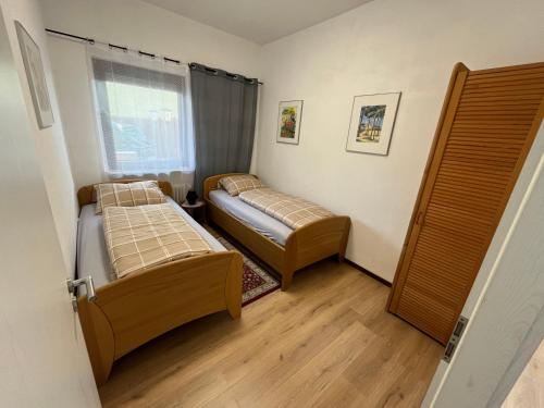 Postel nebo postele na pokoji v ubytování Safran Ferienwohnung