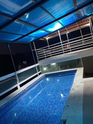 a swimming pool on top of a building at Casa ziranda in Chapala