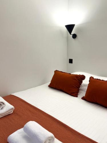 Ένα ή περισσότερα κρεβάτια σε δωμάτιο στο Casa Livia - studio design au coeur de Trouville