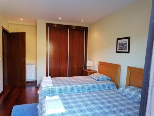 Postel nebo postele na pokoji v ubytování Altes Kellerhaus In Gerês