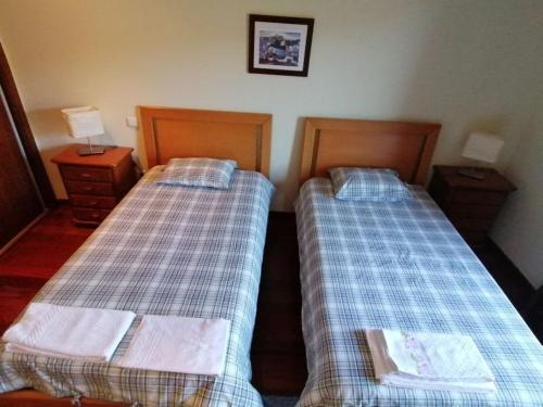 Postel nebo postele na pokoji v ubytování Altes Kellerhaus In Gerês