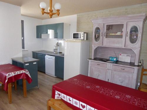 Una cocina o cocineta en Duplex ski et rando in Oh Jura!