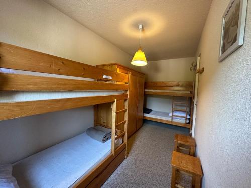 Una cama o camas en una habitación de Duplex ski et rando in Oh Jura!