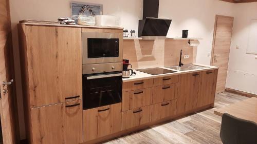 Kuchyň nebo kuchyňský kout v ubytování Ferienwohung Zirbe