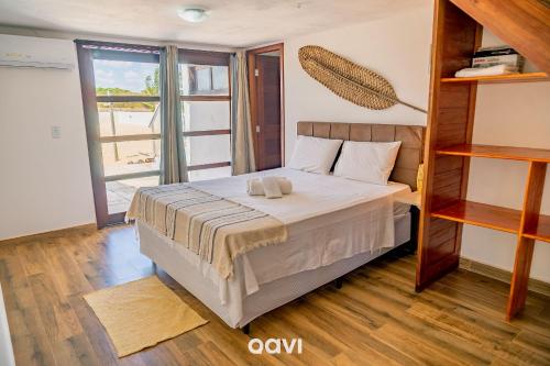 Postel nebo postele na pokoji v ubytování Qavi - Casa Palm Paradise #ParaisoDoBrasil