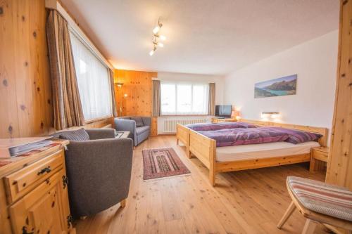 Ένα ή περισσότερα κρεβάτια σε δωμάτιο στο Chesa Talvo