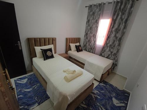 Ένα ή περισσότερα κρεβάτια σε δωμάτιο στο Dar ilham