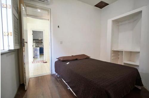 Ένα ή περισσότερα κρεβάτια σε δωμάτιο στο Casa para temporada cumbuco