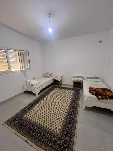 Ένα ή περισσότερα κρεβάτια σε δωμάτιο στο Dar anas