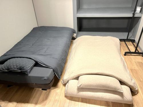 Postel nebo postele na pokoji v ubytování Crux Corp 205 - Vacation STAY 18862