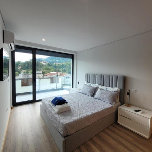 Postel nebo postele na pokoji v ubytování Gerescasadapraia