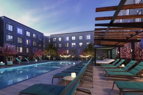 an rendering of a hotel with a swimming pool at Hyatus Luxury Residences Boston Everett Signature Collection in Everett