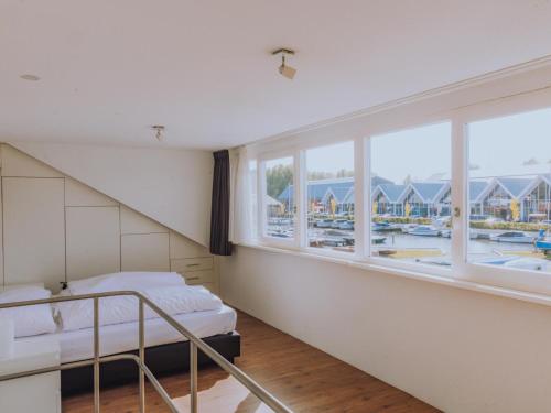 Postel nebo postele na pokoji v ubytování Het Kraaijennest Miva