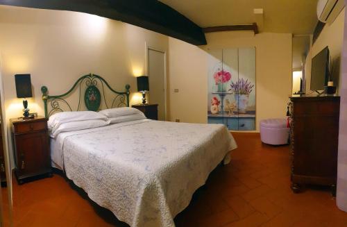 Ένα ή περισσότερα κρεβάτια σε δωμάτιο στο Mosaico ApartHotel