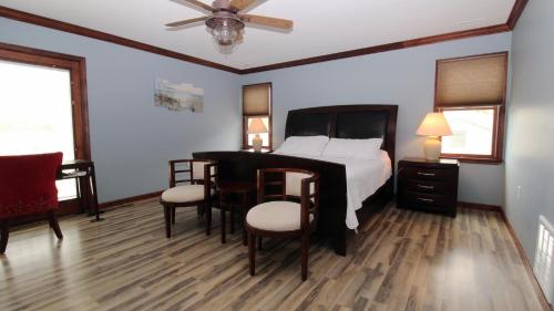 Voodi või voodid majutusasutuse Sunset Breeze Manor toas