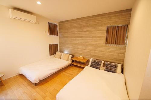 Voodi või voodid majutusasutuse JR Kotohira Station nearby 1 building for rent Children welcome toas