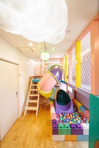 a childs room with a lego play room at KOTOVilla JR琴平駅近く丸々貸切一棟室内アスレチック in Kotohira