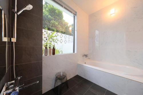 Koupelna v ubytování -Villa Rikyu- 離宮別館