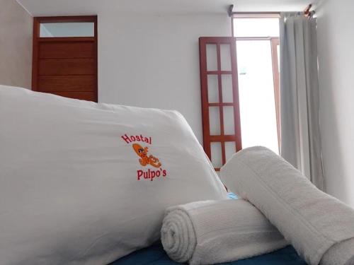 Postel nebo postele na pokoji v ubytování Los Pulpos