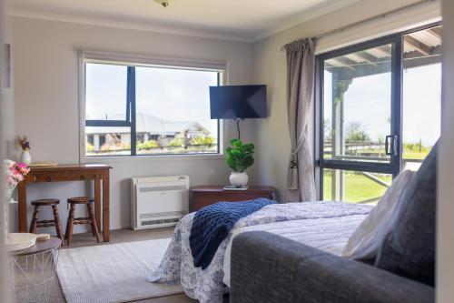 Ένα ή περισσότερα κρεβάτια σε δωμάτιο στο Keogans View - Spectacular Mountain & Ocean Views