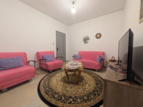 Μια τηλεόραση ή/και κέντρο ψυχαγωγίας στο Evros Stay - Central Family Apartment in Alexandroupoli