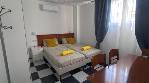 Postel nebo postele na pokoji v ubytování Planta Baja en La Zenia Beach