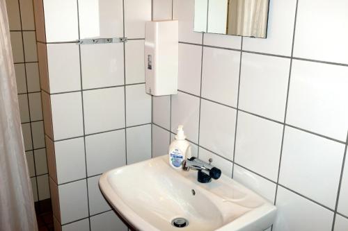 Kupaonica u objektu Løkken Hostel