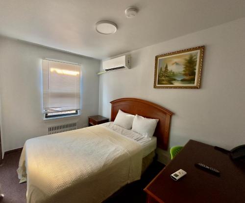 Voodi või voodid majutusasutuse Chinatown Hotel Chicago toas