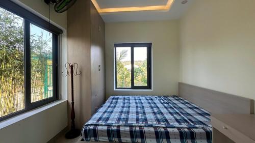 Ένα ή περισσότερα κρεβάτια σε δωμάτιο στο G8 Chill Villa - Ong Lang, Phu Quoc