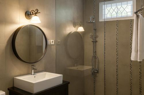 Ένα μπάνιο στο Hotel Purnama Lenggang