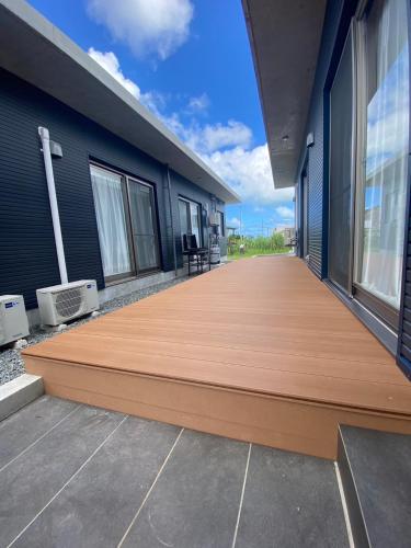 a deck on the side of a house at Hale Twelve AB in Miyako-jima
