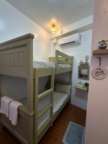 Ένα ή περισσότερα κρεβάτια σε δωμάτιο στο The ComfyNook Hostel