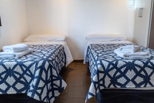 Un pat sau paturi într-o cameră la Casa del viento