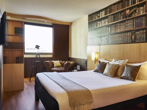 Ένα ή περισσότερα κρεβάτια σε δωμάτιο στο Ibis Barcelona Centro (Sagrada Familia)