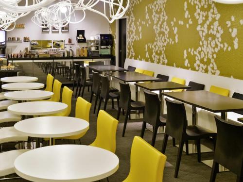 Un restaurante u otro lugar para comer en Adagio Grenoble Centre