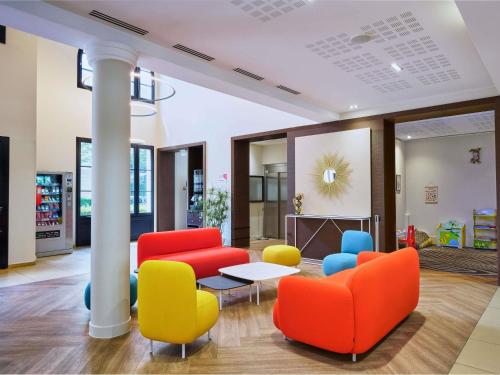 A seating area at Adagio Serris Val d'Europe