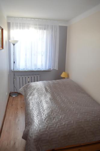 Posteľ alebo postele v izbe v ubytovaní Apartament Ustrzyki