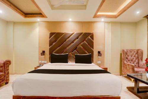 Voodi või voodid majutusasutuse Super Townhouse Oak Amity University Patna Formerly The Golden Crown toas